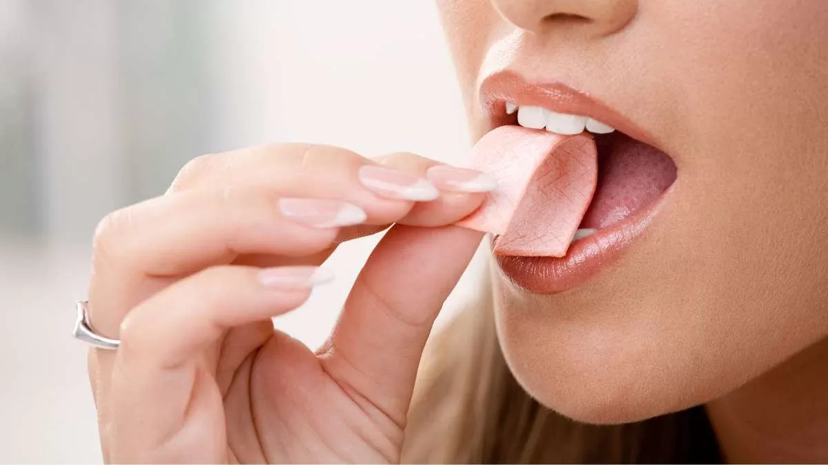 A Girl Eating a Chewing Gum