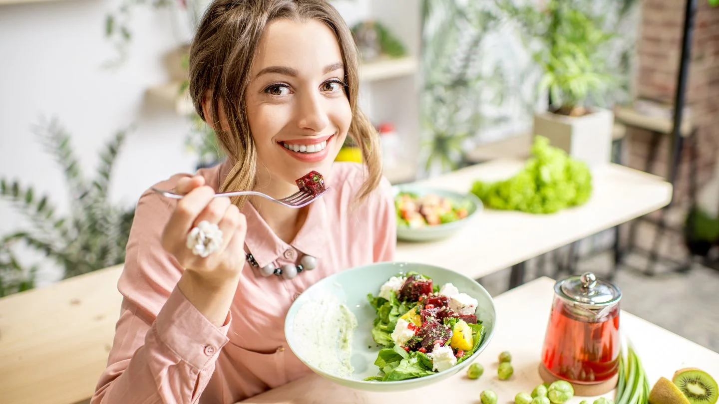 Woman Eating Healthy Salad